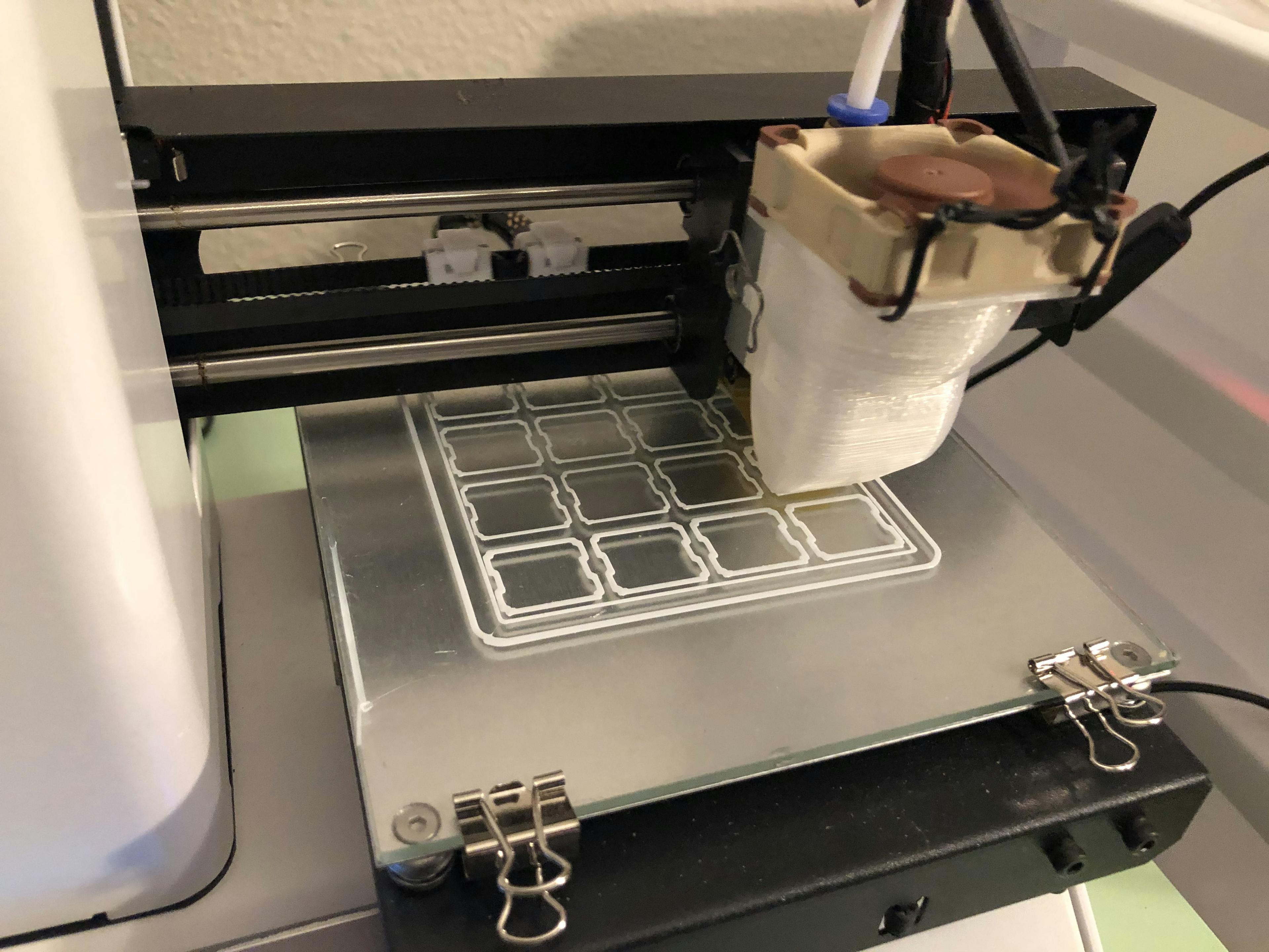 3d printer producing the first layer of a switch tester